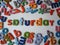 Saturday banner with colorful lower case letters