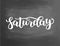 Saturday. Handwriting font by calligraphy. Vector illustration on blackboard background. EPS 10. Brush chalk lettering
