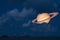 Saturn back night cloud sunset on the sea ,concept Saturn near E