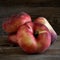 Saturn peaches on wooden table.