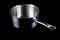 Saucepan with handle stainless steel non-stick cooking utensils on a black background, isolate