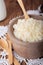 Saucepan with milk rice porridge and clarified butter