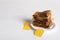 Saucer with used tea bags on white wooden table. Space for text