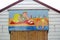 Saucy postcard beach hut painting