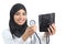 Saudi arab woman showing a sphygmomanometer