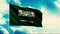 Saudi Arabia flag waving in the wind on a flagpole, seamless loop. Motion. Highly detailed fabric texture on a blue sky