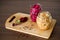 Sauerkraut with beets and spices in a glass jar on wooden backgr