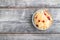 Sauerkraut, marinated cabbage on a gray wooden background. Top view, copy space