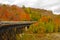 SAULT STE MARIE, CANADA -  26 SEPT 2001: The Agawa Canyon Tour Train winds its way through brilliant fall foliage