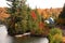 SAULT STE MARIE, CANADA -  26 SEPT 2001: Fall Pond with docked boat and RR Tracks at Agawa Canyon