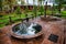 Sauna pool and jacuzzi with rest recreation area outdoor in luxury forest villa.