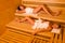 Sauna two women relaxing lying wrapped towel