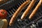 Sausage on barbecue grill close-up