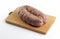 Sausage Cotechino on cutting board