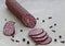 Sausage and spices on parchment paper. View from above topview