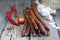 Sausage and spices on vintage wooden boards