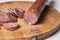 Sausage on a wooden board isolated on a white background.Food