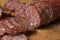 Sausage on a wooden board isolated on a white background.Food