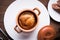 Sausage Yorkshire pudding in the baking pot on wooden background top view