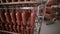 Sausages in the factory freezer storage. Ready, made meet ptoducts at a big food warehouse.