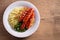 Sausages, mashed potatoes, green peas and onion gravy. Homemade Bangers and Mash.