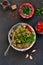 Sauteed eggplant. Salad of baked eggplants on a dark background.