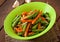 Sauteed green beans with carrots, onion and garlic