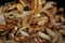 Sauteing mushrooms and onions in a frying pan with oil, seasoning, and steam