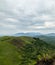 Savana mountains landscape with clouds and fog