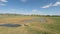 Savanna landscape with water hole