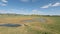 Savanna landscape with water hole