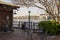 The Savannah Convention Center along the banks of the Savannah River at The River Street Market Place with black metal tables