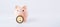 Save currency bitcoin. Pink pig bank with golden bit coin money BTC on white background. Save money investment and