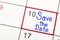 Save the Date written on a calendar