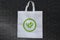 Save earth green printed on white bag