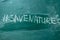 Save the nature hashtag it handwritten with white chalk on a green blackboard