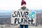 Save the planet poster in the hands of a child. Reducing the use of agricultural land.Farmland preservation concept