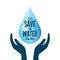 Save The Water. Hands holding drop save water. Concept of eco and world water day.