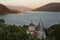 Savina Monastery - Serbian Orthodox monastery against the backdrop of a mountain range and the Bay of Kotor at sunset