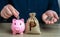 Savings management. Pig piggy bank and philippine peso money bag. Banks and finance. Savings and accumulation of funds from