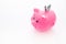 Savings. Moneybox in shape of pig with banknotes falling into it on white background space for text