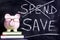 Savings plan - Piggybank with spending saving advice