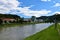 Savinja river flowing past Lasko and Lasko brewery on the river shore