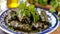 Savor the Delightful Medley of Stuffed Grape Leaves: A Parsley-Garnished Feast in