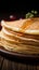 Savor the detail close up of delicate thin pancakes on wood