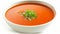 Savoring the Delight: Scrumptious Tomato Soup Bowl on White Background