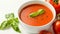Savoring Simplicity: A Captivating Bowl of Tomato Soup on a White Background