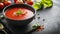 Savoring the Taste: A Bowl of Hearty Tomato Soup on Grunge  Background