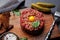 Savory beef tartare and brown bread toasts