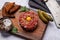 Savory beef tartare and brown bread toasts